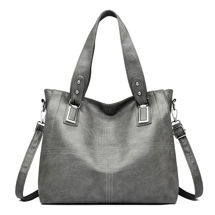 Hladká crossbody kabelka s priestranným tvarom
