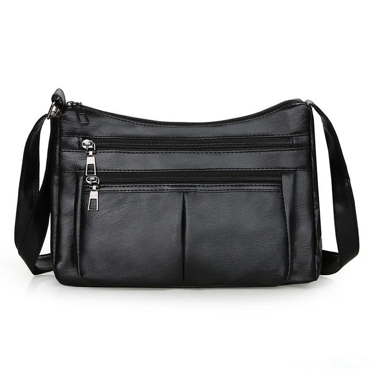 Hladká crossbody kabelka s viacerými vreckami