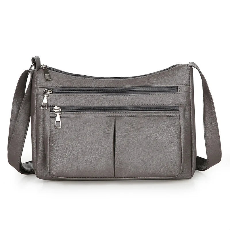Hladká crossbody kabelka s viacerými vreckami