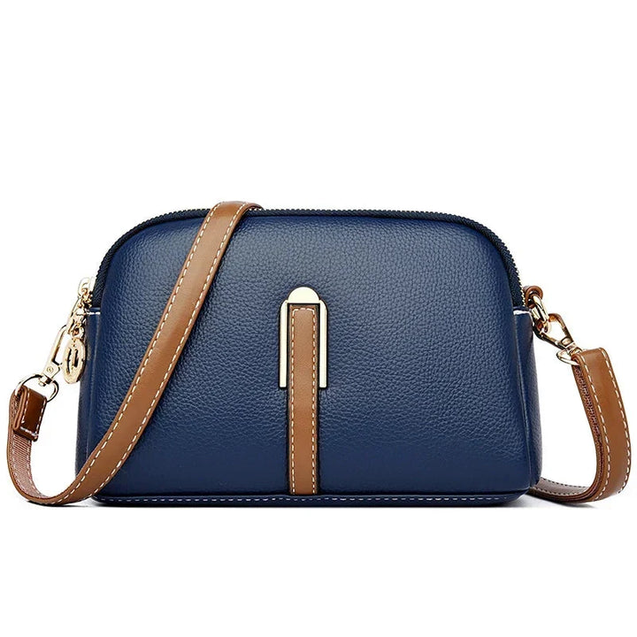 Táto kompaktná crossbody kabelka je ideálna na dni plné pohybu